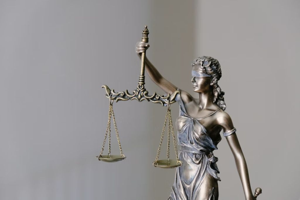 metal justice scale figure