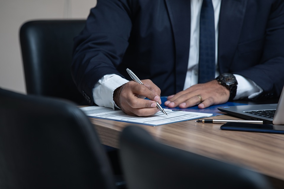 personal injury lawyer working in their office